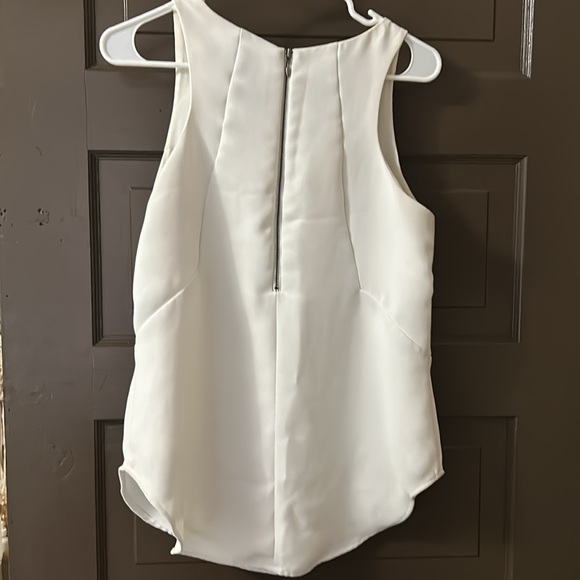 White sleeveless blouse by CAbi size small - Picture 7 of 7